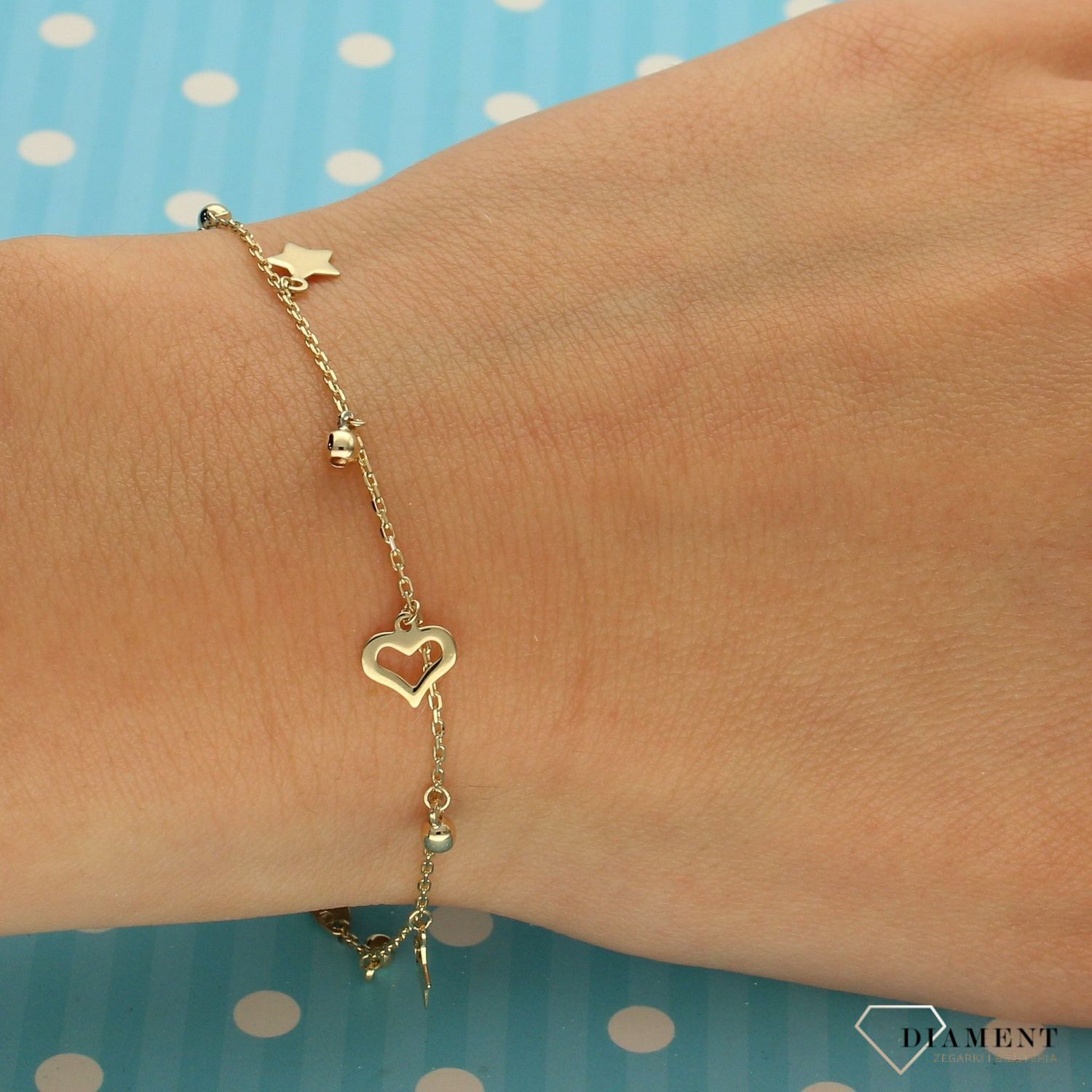 Złota bransoletka celebrytka 333 'wiszące elementy gwiazdka, kuleczki, serce' (1).jpg